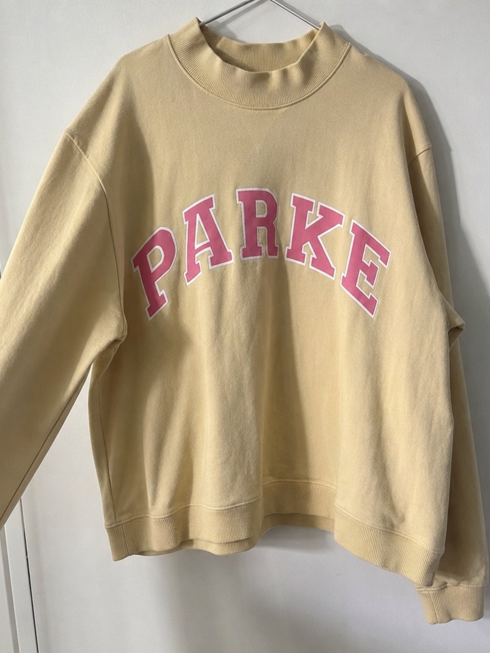 Parker Pale Yellow Crewneck Sweatshirt with Pink Arch Logo